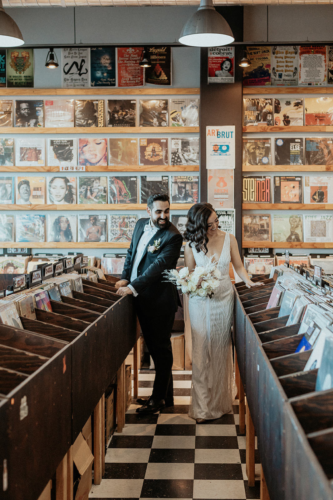 A couple together at a record store